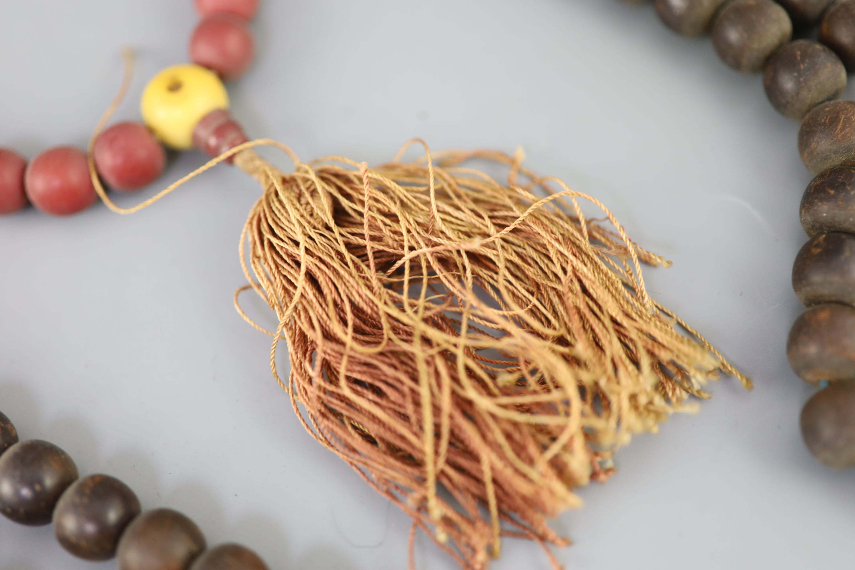 A Sino-Tibetan Buddhist seed bead rosary, 19th century and a Chinese composition bead rosary, early 20th century Provenance - A. T. Arb